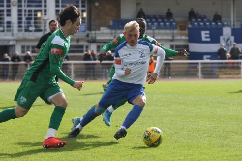 Leatherhead's Joe Leslie (L) and Dan Hector and Enfield's Ryan Blackman