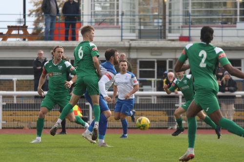 Leatherhead's Will Seager (6) challenges Billy Bricknell watched by Will Salmon (L), Lyle Della-Verde and Crossley Lema (2)