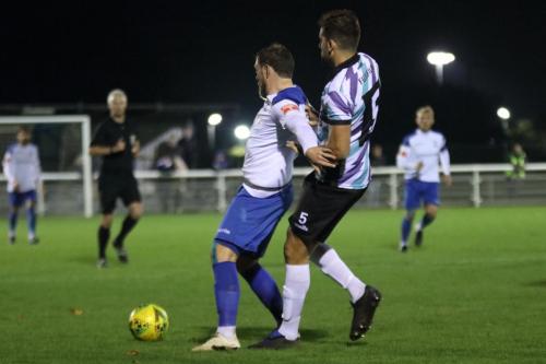 Enfield's Billy Bricknell (L) and Margate's Liam Friend