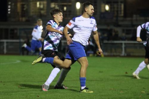 Enfield's Lyle Della-Verde (R) and Margate's Archie Burnett