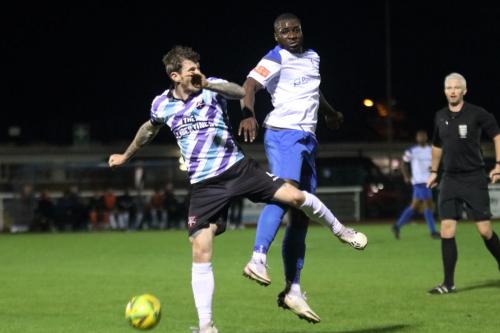 Enfield's Percy Kiangebeni (R) and Margate's Reece Prestedge