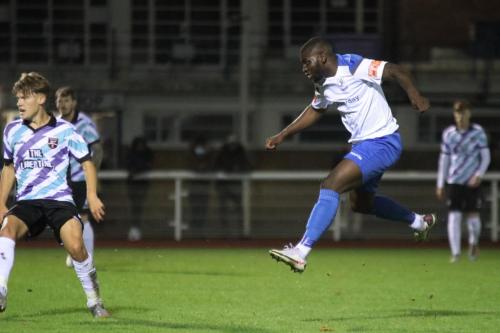 Enfield man of the match Percy Kiangebeni shoots