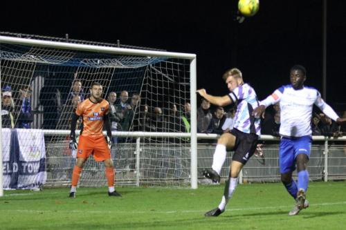 Margate's Ben Swift (centre) clears from Junior Mubiayi