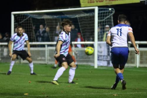 Margate's Jay Porter (centre) blocks a cross from Lyle Della-Verde
