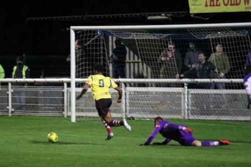 Corie Andres rounds Enfield keeper Nathan McDonald before scoring the opening goal
