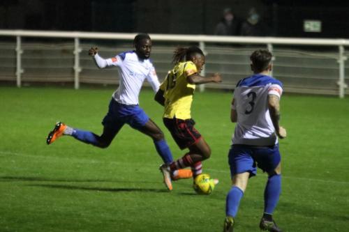 Enfield's Adam Pepera (L) and Lee Chappell and Kingstonian's Kadell Daniel