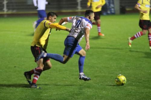 Enfield's Lyle Della-Verde (R) and Kingstonian's Tom Kavanagh