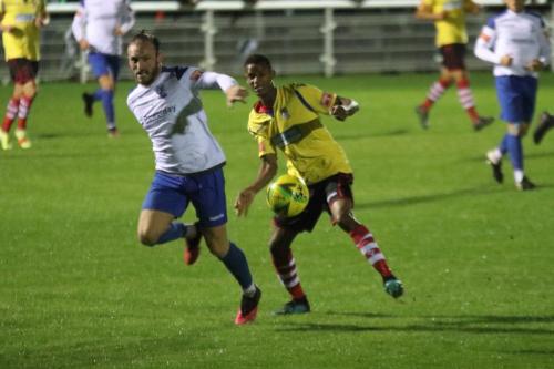 Enfield's Scott Thomas (L) and Kingstonian's Gus Sow
