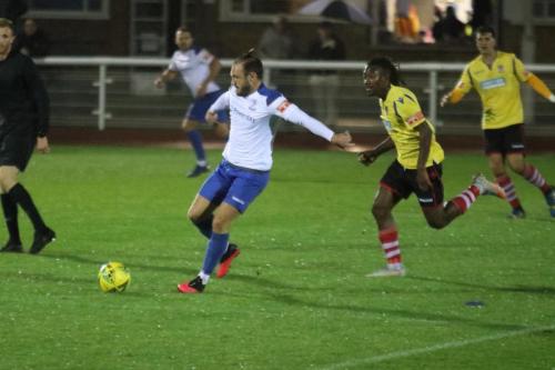 Enfield's Scott Thomas (L) and Kingstonian's Kadell Daniel