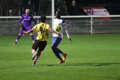 Kingstonian's Corie Andrew (L) and Enfield's Adam Pepera