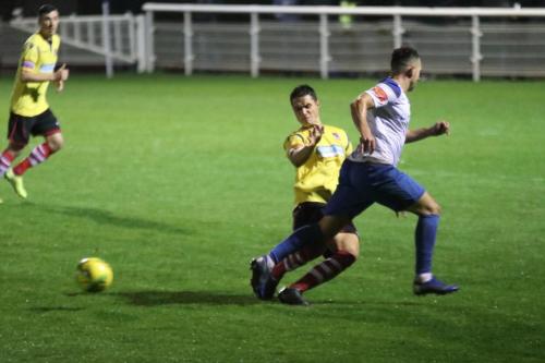 Kingstonian's Fabio Saraiva tackles Lyle Della-Verde