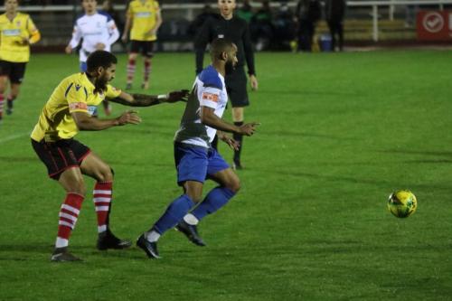 Kingstonian's Harry Osborne (L) and Enfield's Jared Small