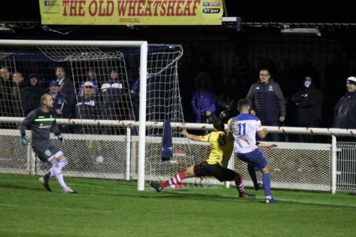 Kingstonian's Rob Tolfrey (L) and Fabio Saraiva and Enfield's Lyle Della-Verde (R)