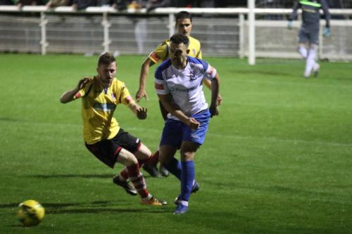 Kingstonian's Tom Richards (L) and Enfield's Lyle Della-Verde