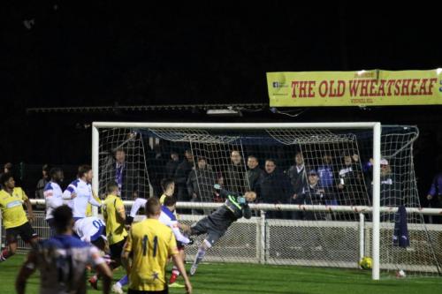 Kingstonian keeper Rob Tolfrey is beaten by Billy Bricknell's header