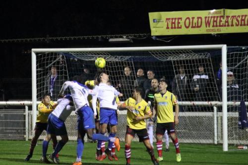 Sam Youngs (white, R) challenges at a set piece