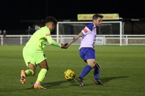 Maldon's Andre Hassanally (L) and Enfield's Lee Chappell