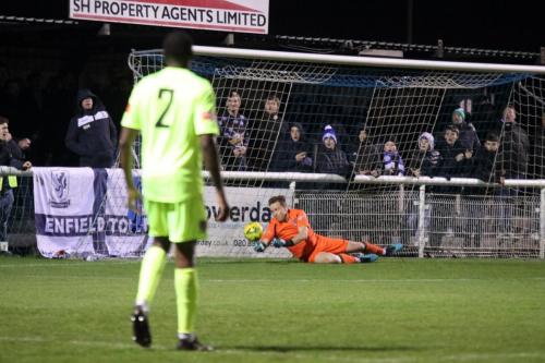 Maldon keeper Ben McNamara saves from Adam Cunnington