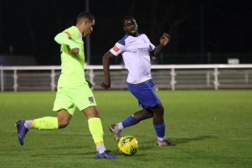 Maldon's Hamza Kaid (L) and Enfield's Percy Kiangebeni