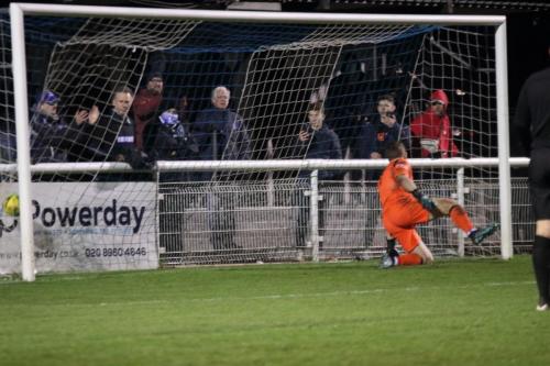 Lee Chappell score Enfield's second penalty to make it 1-1