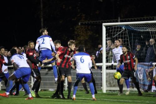 Josh Urquhart (2) wins a header