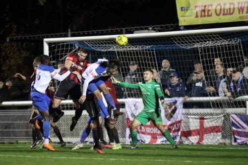 Sam Youngs (white, L) wins a header but send it wide