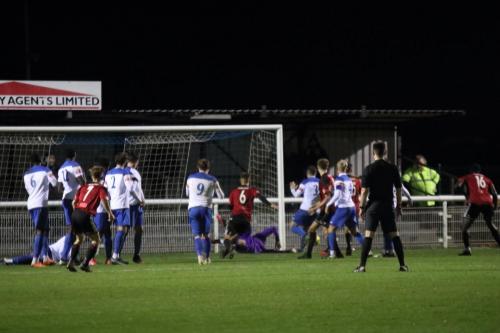 Enfield's keeper Nathan McDonlad tips the ball past the post with the last touch of the game