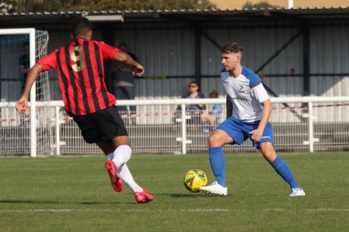 Enfield's Lee Chappell (R) and Lewes' Aaron Cosgrave