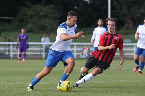 Enfield's Lyle Della-Verde (L) and Lewes' Ronnie Conlon