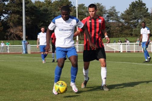 Enfield's Percy Kiangebeni (L) and Lewes' James Beresford