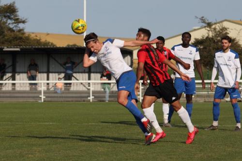 Enfield's Sam Youngs (L) and Lewes' Aaron Cosgrave