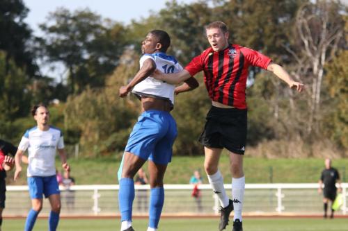 Enfield's Shaun Okojie and Lewes' Nic D'Arienzo (R)