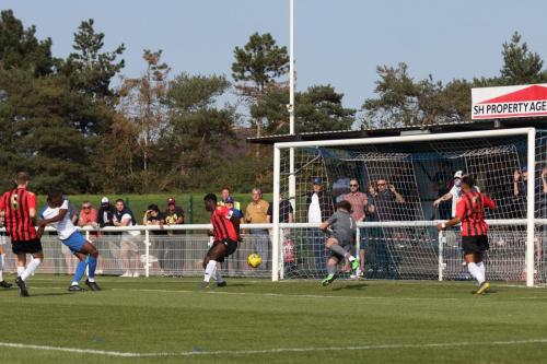 Enfield's Shaun Okojie scores the opening goal