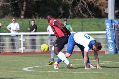 Lewes' Christian Frimpong (L) gets the better of Billy Bricknell