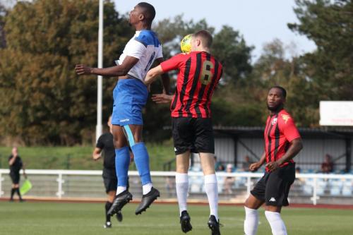 Lewes' Nic D'Arienzo (6) challenges Shaun Okojie