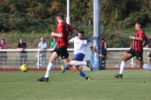 Lyle Della-Verde scores the fourth Enfield goal
