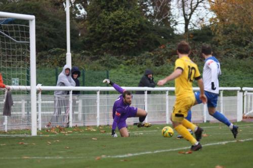 An early scare for Enfield keeper Dan Lincoln as the ball is crossed from the right wing