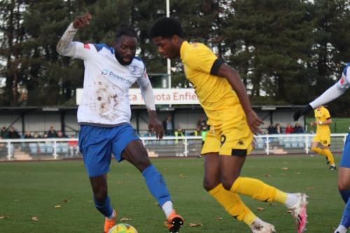 Enfield's Adam Pepera (L) and Ramsgate's Joshua Ajayi