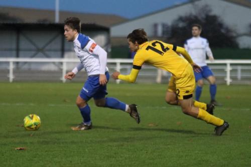 Enfield's Lewis Taaffe (L) and Ramsgate's George Nikaj