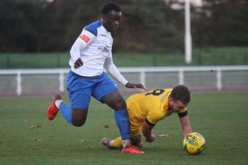 Enfield's Neville Nzembela (L) and Ramsgate's Mitchell Chapman