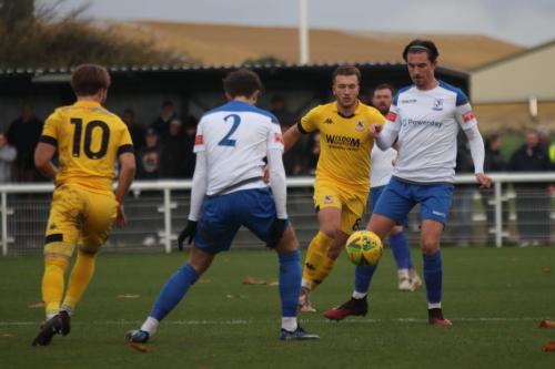 Enfield's Sam Youngs (R) and Josh Urquhart and Ramsgate's Ashley Miller (L) and Mitchell Chapman