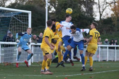 Enfield's Sam Youngs (white, L) and Josh Urquhart challenge the Ramsgate defence