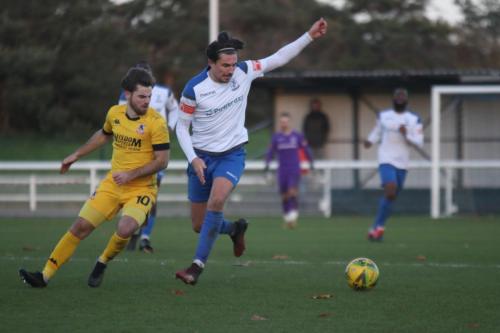 Ramsgate's Ashley Miller (L) and Enfield's Sam Youngs
