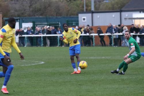 IMG 7473-Andre-Coker-centre-tries-to-pick-out-Muhammadu-Faal