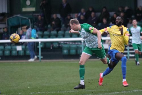 IMG 7526-Biggleswades-Shane-Bush-heads-clear-from-Muhammadu-Faal