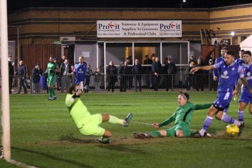 IMG 7647-Lewis-Taaffe-slide-is-just-to-late-to-reach-a-cross-from-the-Enfield-right