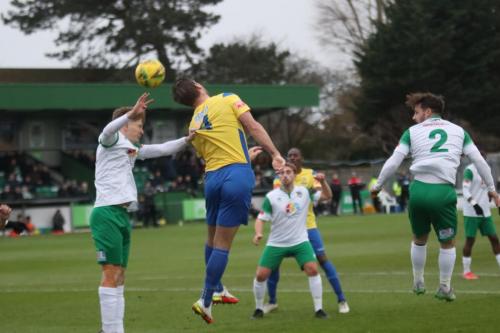 IMG 8749-Enfields-Adam-Cunnington-flicks-the-ball-on-despite-the-efforts-of-Ethan-Robb-to-hold-him-down