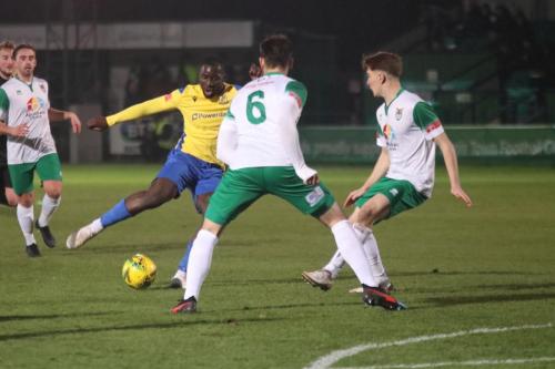 IMG 8845-Enfields-Percy-Kiangebeni-turns-past-Craig-Robson-6-and-Ethan-Robb