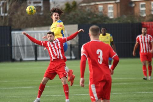 IMG 2137-Sam-Youngs-wins-a-header-against-Jamie-Dicks