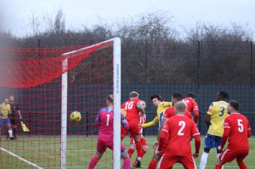 IMG 2374-Enfields-Sam-Youngs-heads-against-the-far-post-the-ball-rebounds-across-the-face-of-goal-and-is-cleared-by-Alex-Bentley-2